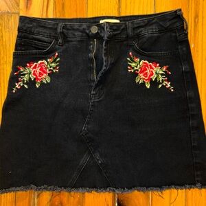 Embroidered black denim skirt